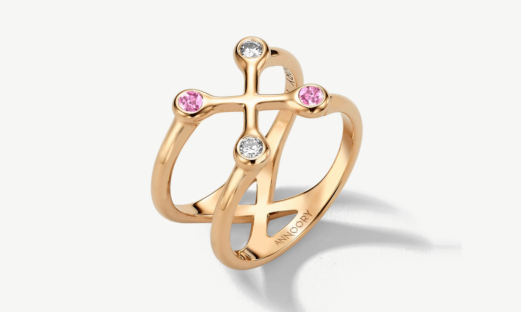 rose gold x ring with diamonds and gemstones